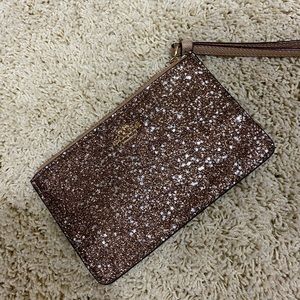 Coach wristlet rose gold